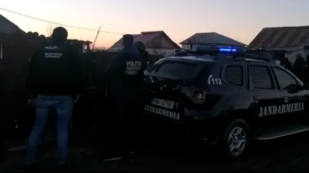 Polițiștii au descins la patru suspecți în cazul crimei de la Bolintin Vale. Zeci de mascați înarmați până în dinți au înconjurat zona