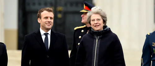 Primul acord semnat de Marea Britanie pentru a opri valul de imigranți. Ce prevede înțelegerea parafată de May și Macron