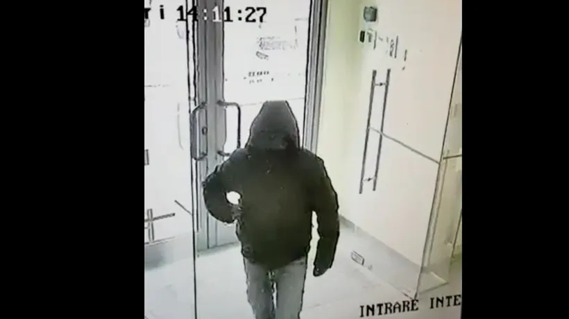 Jaf armat la o bancă din Craiova. Cum arată TÂLHARUL
