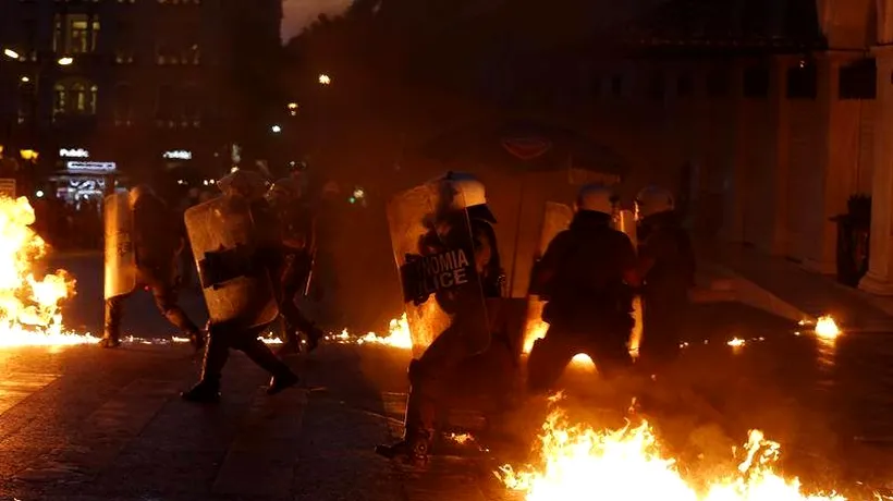 Parlamentul Greciei a aprobat noul plan de austeritate convenit la Bruxelles. Incidente violente au avut loc în centrul Atenei