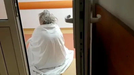 Pacienții COVID-19, în stare deplorabilă! Stau pe jos, înveliți doar în cearșafuri