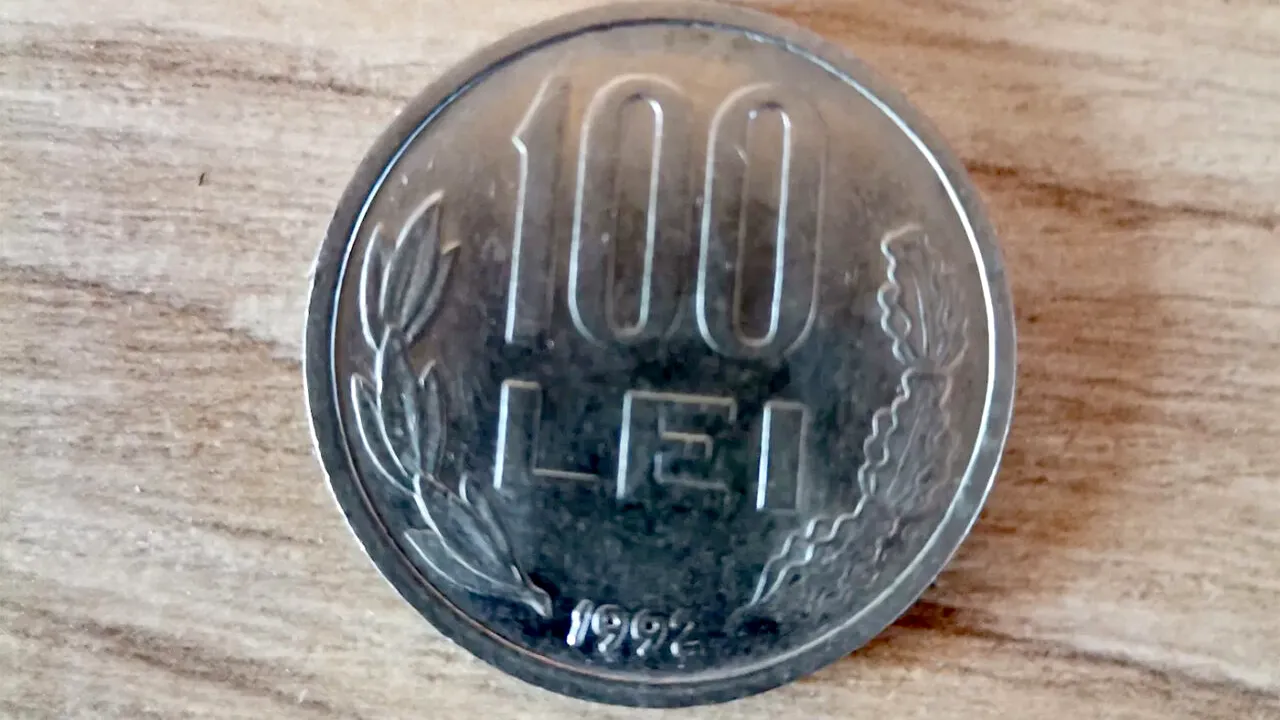 Mai știi celebra monedă de 100 lei din anii '90? Suma uriașă cu care se vinde acum, în 2026