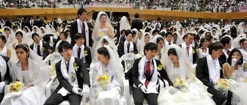 VIDEO. 3.500 de cupluri, căsătorite în aceeași zi de o organizație religioasă controversată