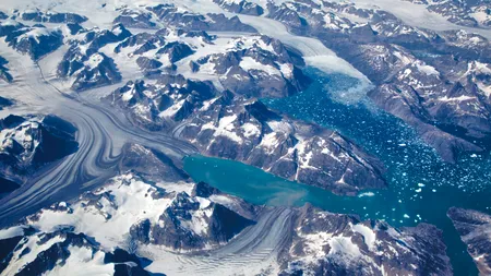 Un CRATER uriaș a fost descoperit sub calota glaciară a Groenlandei. Ce spun experții