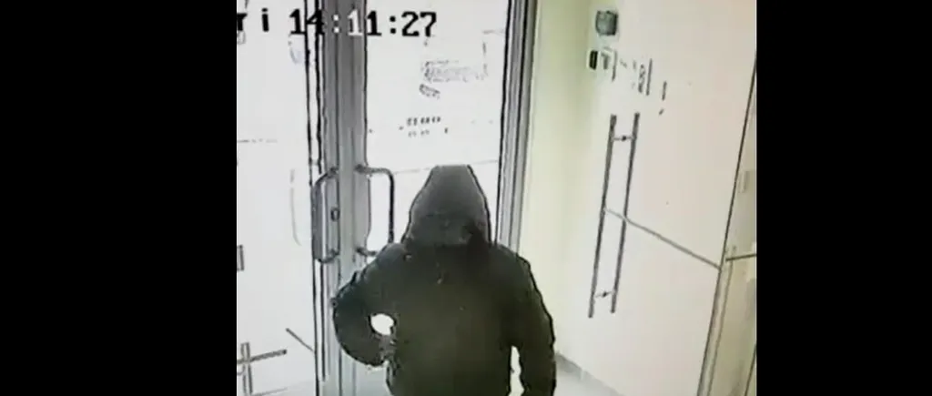 Jaf armat la o bancă din Craiova. Cum arată TÂLHARUL