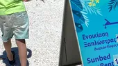 Să vezi și să nu crezi! Câți euro costă un șezlong pe o plajă din Thassos. Un turist român a făcut poza: „Aveți și o băutură de banii ăștia!”