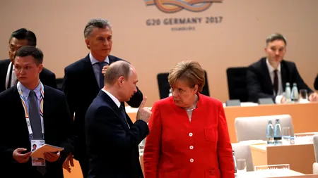 Putin, avertisment clar pentru Merkel: Speculațiile referitoare la posibila utilizare a armelor chimice în Siria sunt inadmisibile