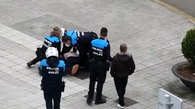 VIDEO. Român arestat în Spania pe stradă, în aplauzele oamenilor care priveau de la balcoane
