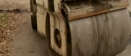 Șoferi cercetați după ce au distrus un drum cu un concasor de peste 64 de tone