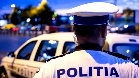 Doi polițiști din Capitală, trimiși în judecată pentru luare de mită. „Suma a fost retrasă de la un bancomat din apropiere și remisă unuia dintre agenți”