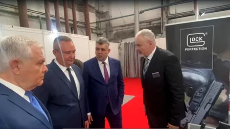 Marcel CIOLACU și Nicolae CIUCĂ  s-au pozat cu armele de la BSDA/Au admirat cel mai popular PISTOL în peste 100 de țări