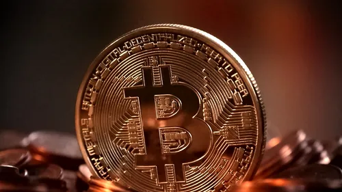 Bitcoin a fost creat în timpul ultimei crize, pentru a le preveni pe următoarele