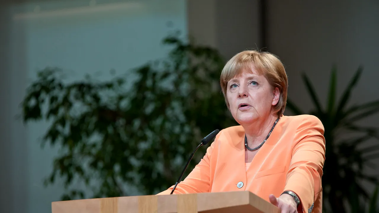 Merkel intră în campanie: cere interzicerea vălului islamic și condamnă criza refugiaților