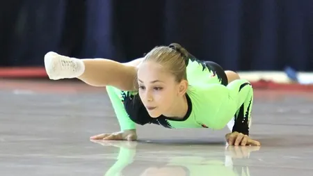 Poveste impresionantă: o fetiță din România abandonată la naștere a devenit campioană mondială la gimnastică aerobică