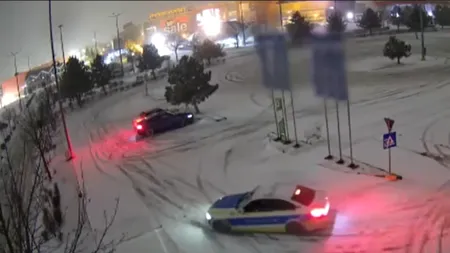 Zeci de șoferi au rămas fără permisul de conducere, după ce au făcut drifturi pe drumurile înghețate din parcările unor mall-uri