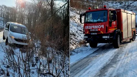 Un șofer a fost la un pas să cadă într-o prăpastie, după ce a DERAPAT cu mașina pe gheață. Pompierii l-au salvat în ultimul moment