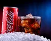 Coca-Cola anunță că modifică rețeta pe care o folosește în SUA pentru cea mai cunoscută băutură a sa. Schimbarea, cerută de Donald Trump