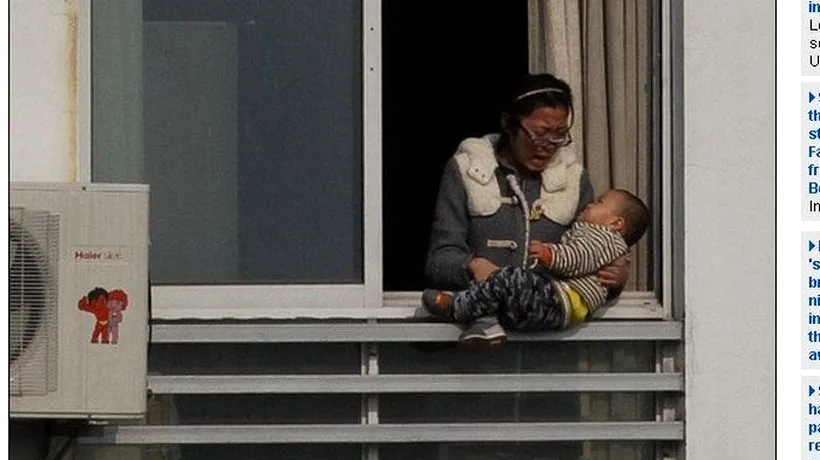 FOTO: Scene îngrozitoare în China. O femeie a amenințat că își aruncă bebelușul de la etajul 12, apoi se sinucide