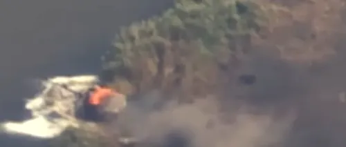 Momente de DISPERARE: Un tanc rusesc a intrat în apă după ce a luat foc