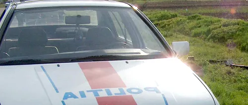 Polițist de la Transporturi găsit împușcat în cap, în mașina de serviciu