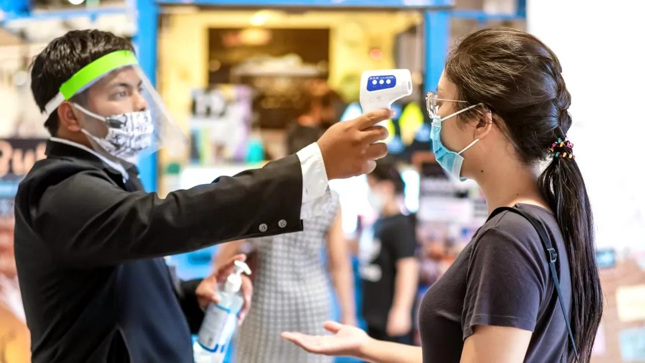 REACȚIE. Ce surpriză poți avea atunci când ți se măsoară temperatura în spațiile publice