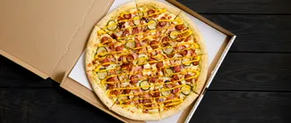 Patronii de restaurante riscă AMENZI uriașe dacă diametrul blatului de pizza este mai mic la servire decât scrie în meniu