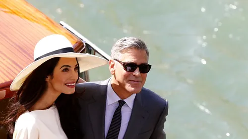 Primele imagini cu soția lui George Clooney în rochie de mireasă 