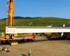 Imagini inedite de la montarea primei grinzi pe lotul 2 al AUTOSTRĂZII Sibiu-Pitești. Sorin Grindeanu: „Sunt necesare 1050 de grinzi din beton”