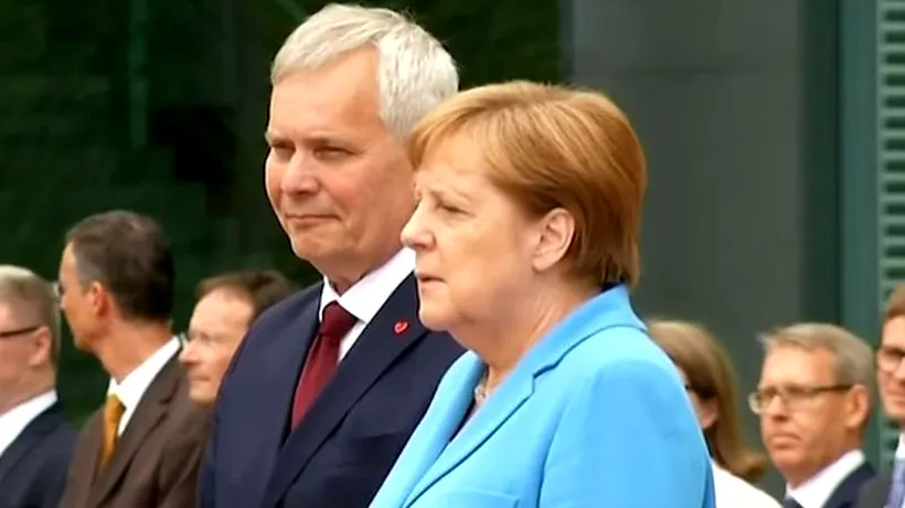 Angela Merkel, surprinsă tremurând pentru a treia oară în ultimele săptămâni