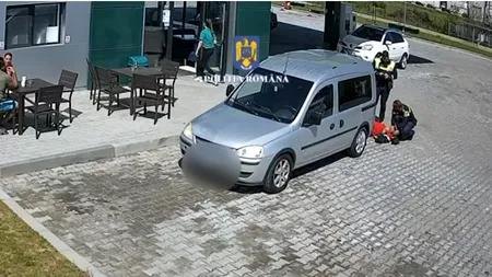 Momentul în care doi polițiști din Argeș SALVEAZĂ viața unui bărbat care a leșinat într-o benzinărie