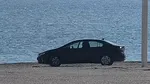 Un bucureștean și-a pus mașina la soare, pe plaja de la Cap Aurora. Imaginile au devenit virale, iar internauții nu l-au iertat: „Fițe, impresii, tupeu. Vine și amenda, nu durează mult”