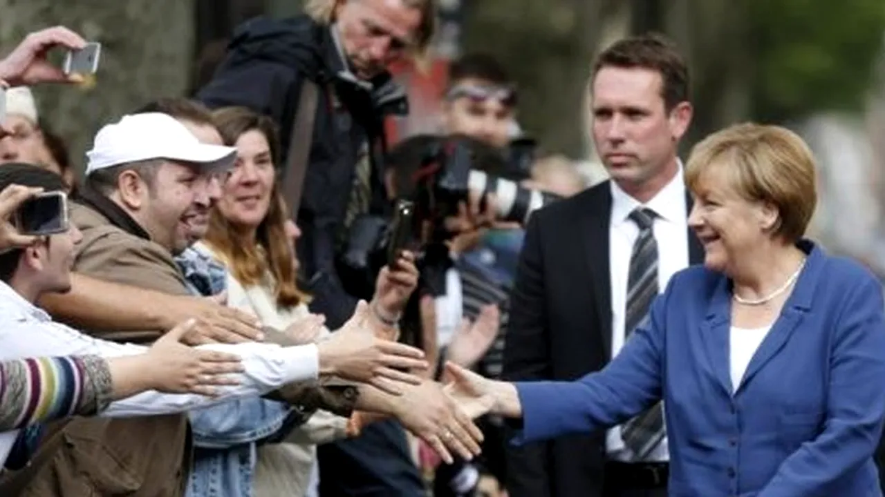 Un migrant sirian, membru al partidului lui Merkel: ''O admir''
