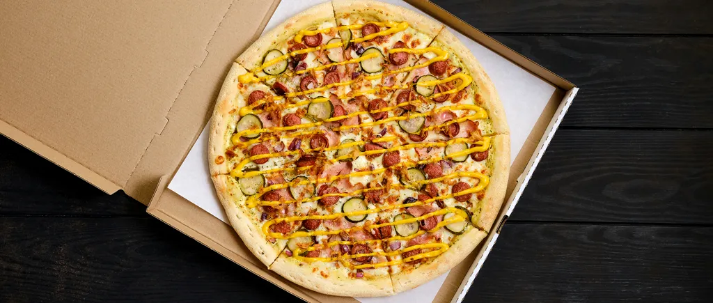 Patronii de restaurante riscă AMENZI uriașe dacă diametrul blatului de pizza este mai mic la servire decât scrie în meniu