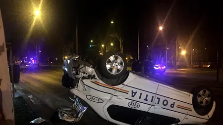 Accident în București. O mașină de Poliție s-a răsturnat | VIDEO