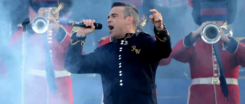 Gestul prin care Robbie Williams și-a șocat fanii. Ce a făcut la un concert. VIDEO