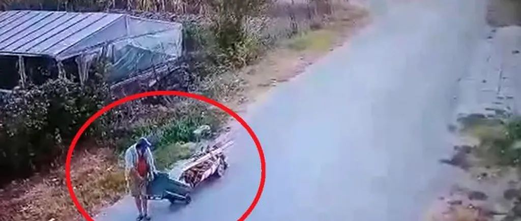 Bărbat mort, din Constanța, dus de fiul său la cimitir într-un cărucior tras de un tomberon (VIDEO)