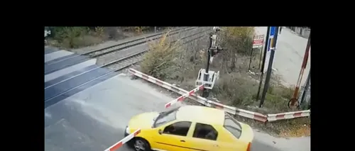 Gest inconștient. Un alt șofer a forțat barierele de la calea ferată (VIDEO)