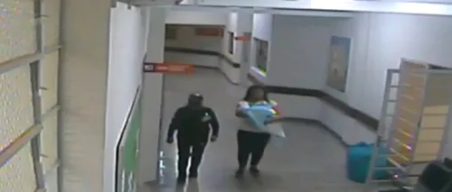 O femeie a încercat să fugă din maternitate cu bebelușul unei mame. Tânăra s-a deghizat în asistentă medicală