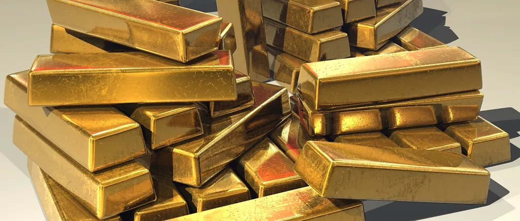 Prețul aurului continuă să se mărească pe fondul războiului din Ucraina și al crizei economice. Cât valorează acum