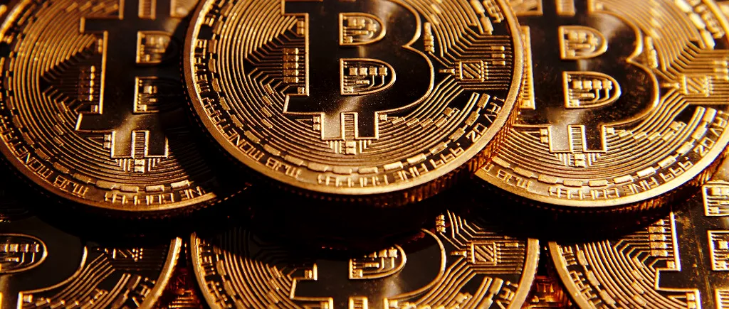 Bitcoin a ajuns la un nou record. Moneda virtuală a depășit valoarea aurului
