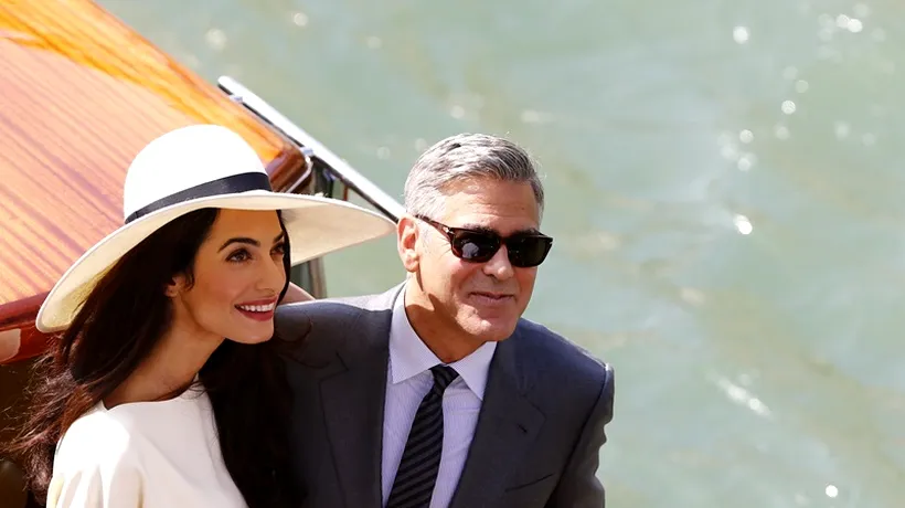 Primele imagini cu soția lui George Clooney în rochie de mireasă 