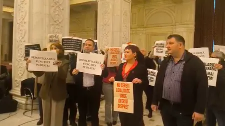 Protest spontan în Parlament, înainte ca Bolojan să-și asume răspunderea pe legea pensiilor magistraților