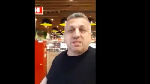 Scandal la un supermarket din Capitală! Un agent de pază a scuipat un client care i-a reproșat că nu poartă mască de protecție (VIDEO)