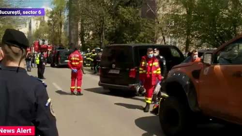 UPDATE. Un bărbat cu un copil în brațe, oprit înainte să se arunce de la etajul 8 al unui bloc din București. Bărbatul a primit mandat de arestare preventivă