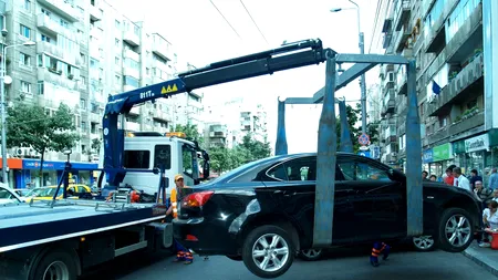 Mașinile staționate neregulamentar, ridicate în Capitală și de pe trotuare. Amenzile aplicate sunt usturătoare