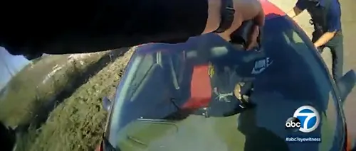 VIDEO | Scene ireale în SUA, unde un polițist a fost luat pe capotă de un individ care nu voia să coboare din mașină. Bărbatul avea mandat de arestare