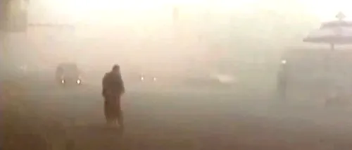 VIDEO. Poluarea a atins cote uriașe la Beijing. Cum sunt chinezii nevoiți să umble pe stradă