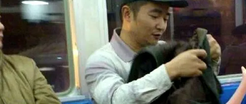 GALERIE FOTO: Ce face un chinez în timp ce merge cu metroul