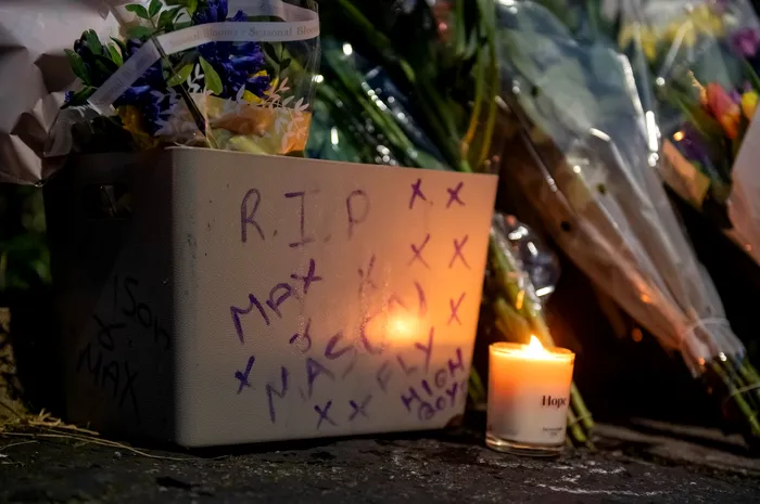 Residents of Knowle West in Bristol light candles after two children were stadded to death, January 28 2024.. See SWNS story SWBNknowle . A murder investigation has been launched following the death of two teenagers in south Bristol. Officers attended Ilminster Avenue, in Knowle West, at around 11.20pm yesterday (Saturday 27 January) where two boys, aged 15 and 16, had been attacked by a number of people who made off from the scene in a car. Police arrived at the scene within minutes of the first call and did what they could to provide first aid. The victims sustained stab wounds and were taken to two hospitals – Southmead Hospital and Bristol Royal Hospital for Children – by ambulance, where they sadly died in the early hours of this morning (Sunday 28 January).,Image: 841370160, License: Rights-managed, Restrictions: This image is supplied for editorial use, commercial use may require additional licenses or permissions.<br srcset=
