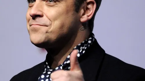 Cântărețul Robbie Williams a devenit tată
